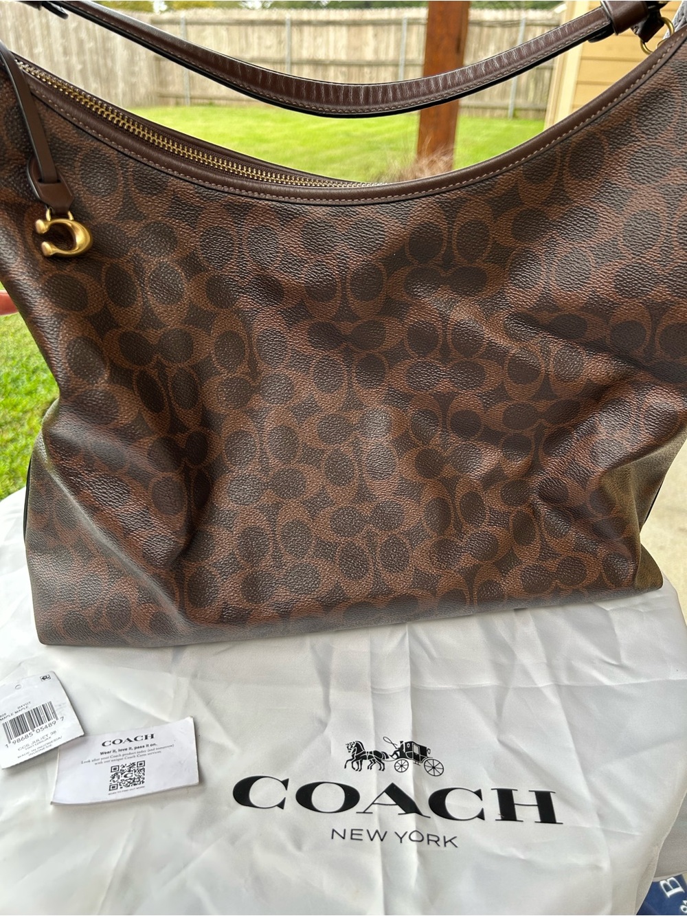 Coach Brown Signature Canvas Shoulder Bag with Gold Hardware